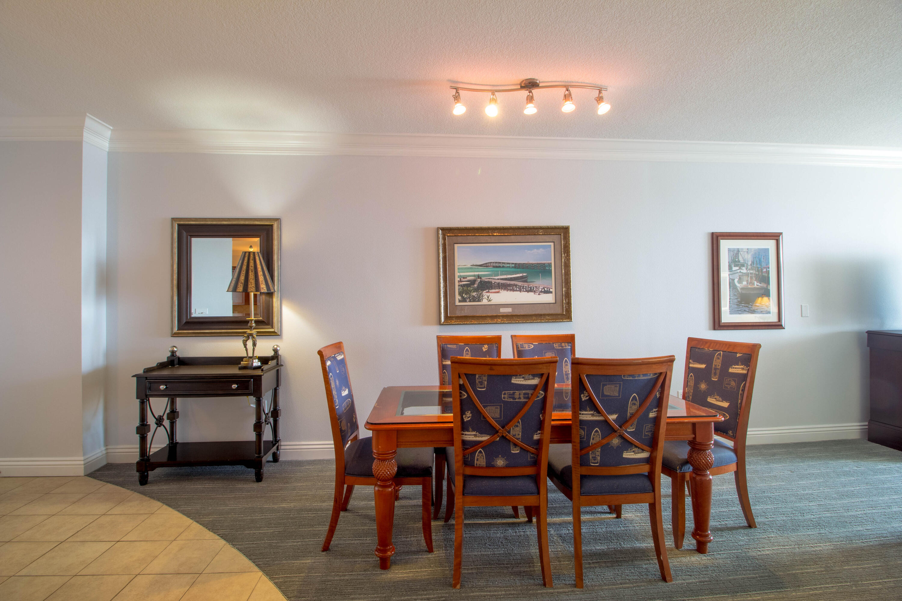 10 Harbor Boulevard, Unit E707H Destin, FL 32541 - Photo 2 of 28 a view of a dining room with furniture and wooden floor