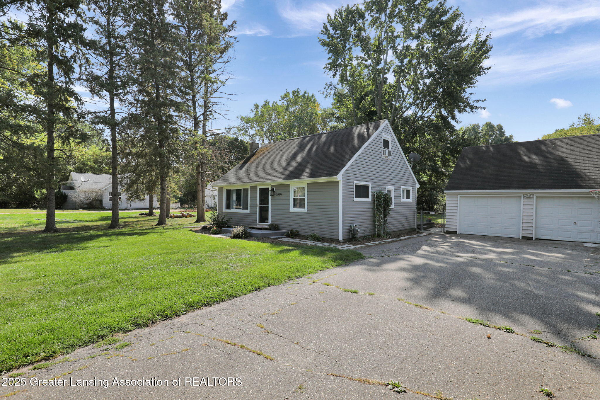 3239 County Line Road East Lansing, MI 48823 - Photo 3 of 43 Driveway
