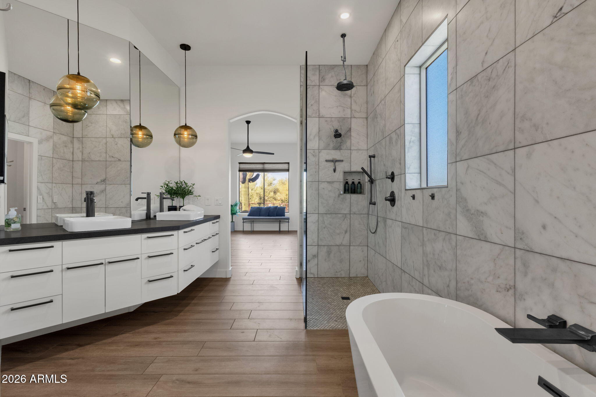 14604 East Peak View Road Scottsdale, AZ 85262 - Photo 25 of 55 a bathroom with a tub sink and mirror