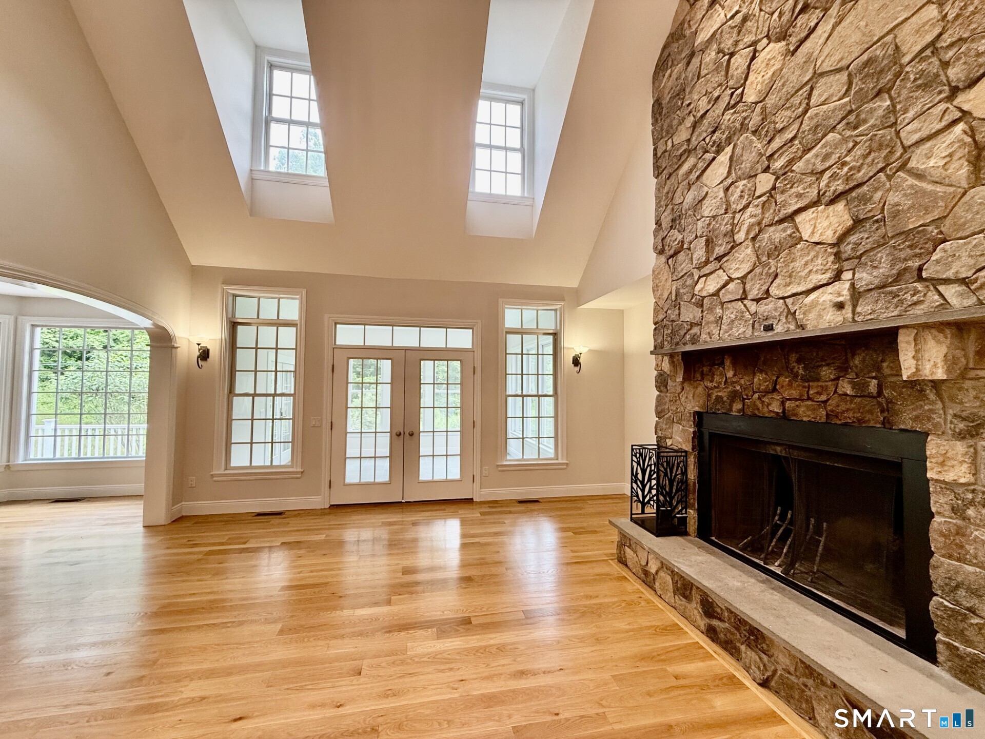 84 Smith Road Lebanon, CT 06249 - Photo 4 of 34 Great room with stone-to-ceiling fire place!