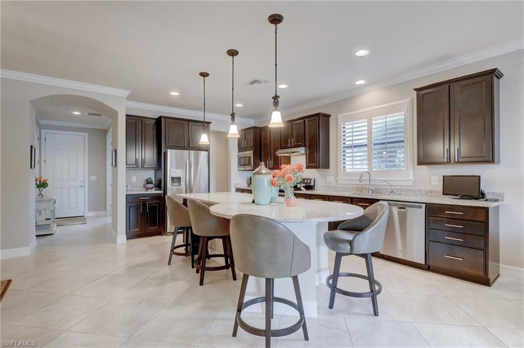 10837 Dennington Road Fort Myers, FL 33913 - Photo 11 of 35 Kitchen with view of Arched Entryway