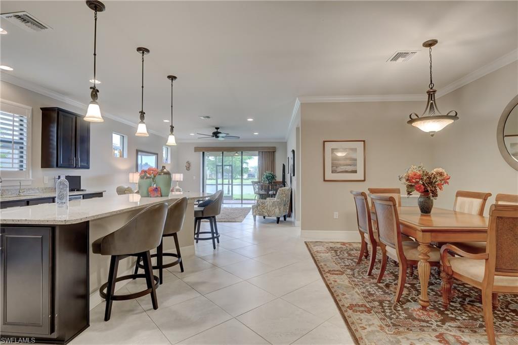 10837 Dennington Road Fort Myers, FL 33913 - Photo 8 of 35 Kitchen with Breakfast Bar