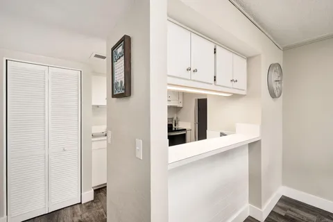 a view of walk in closet with window