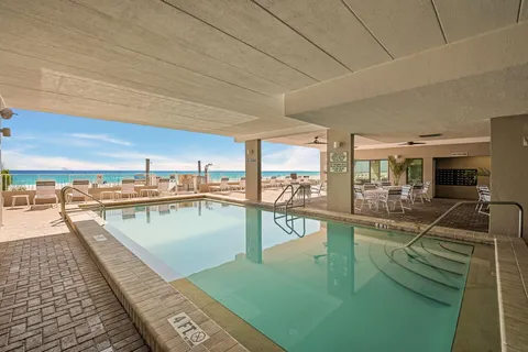 a view of a swimming pool and outdoor space