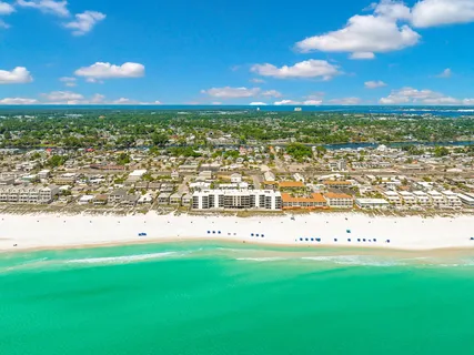 a view of an ocean and city
