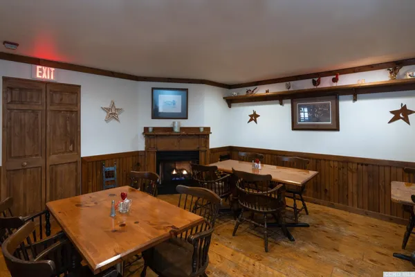 a view of a livingroom with furniture