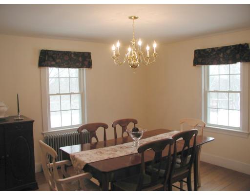 35 Benjamin Road Shirley, MA 01464 - Photo 3 of 13 a view of a dining room with furniture and chandelier