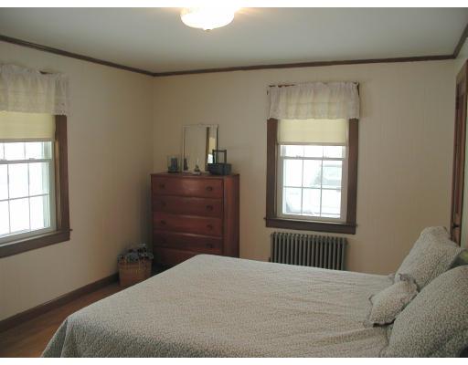 35 Benjamin Road Shirley, MA 01464 - Photo 10 of 13 a bedroom with a bed and a window