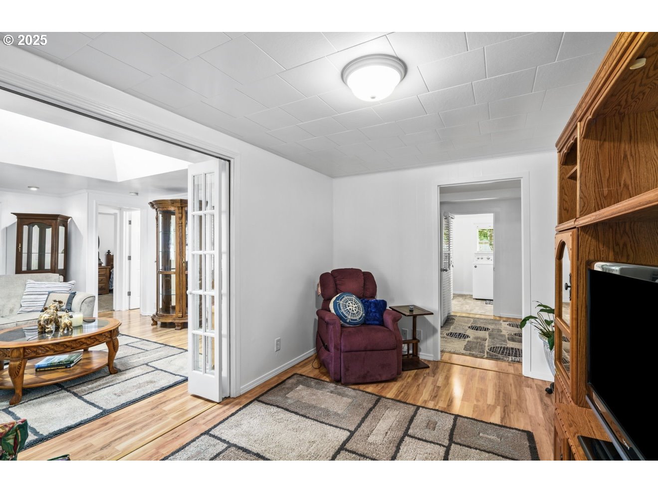 1995 Scott Road Springfield, OR 97477 - Photo 16 of 43 a living room with furniture and a flat screen tv
