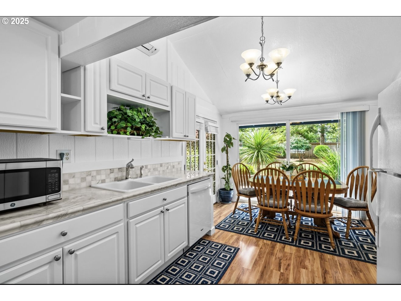 1995 Scott Road Springfield, OR 97477 - Photo 17 of 43 a view of dining room and wooden floor