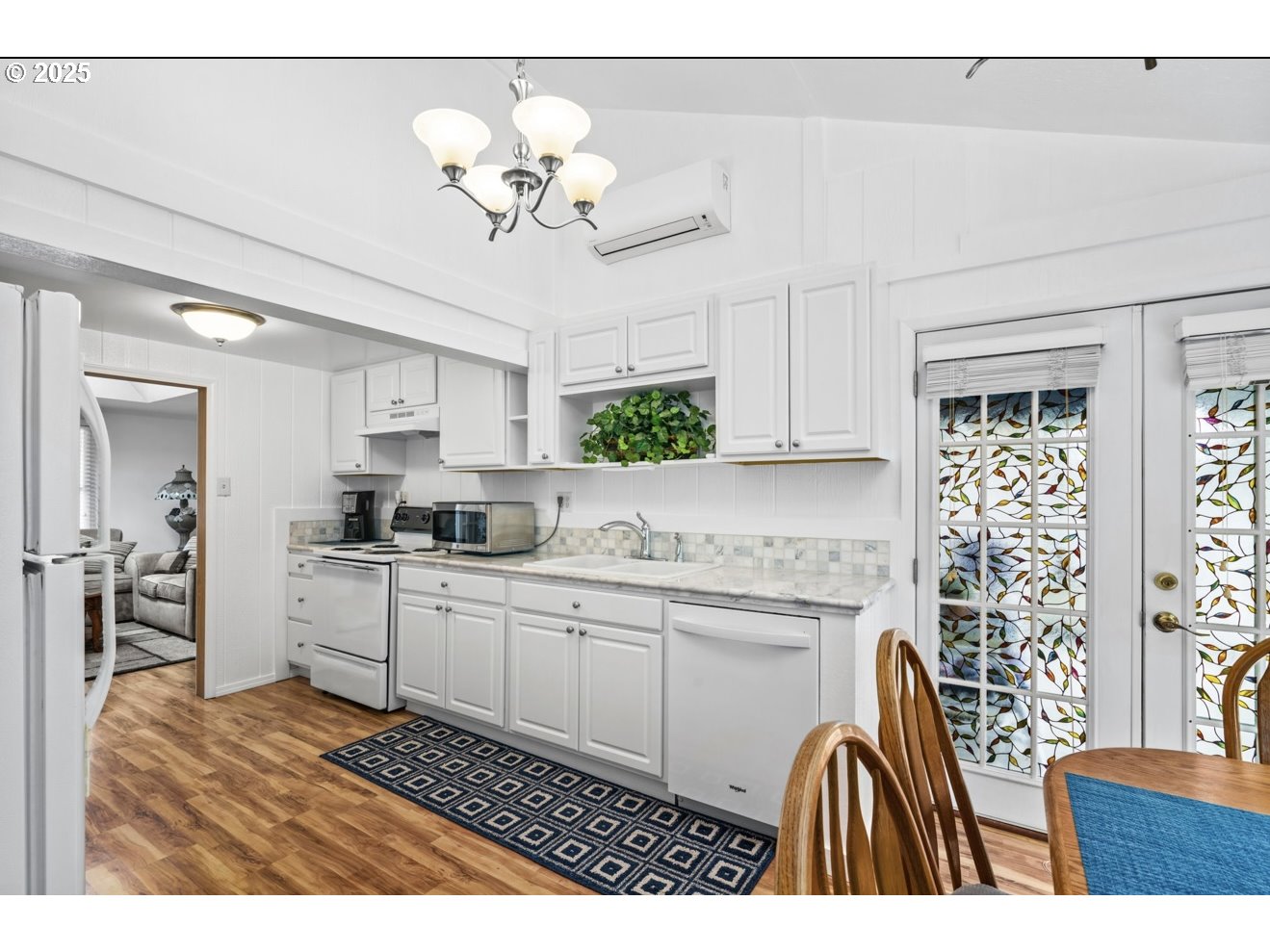 1995 Scott Road Springfield, OR 97477 - Photo 20 of 43 a kitchen with cabinets a sink stainless steel appliances and window