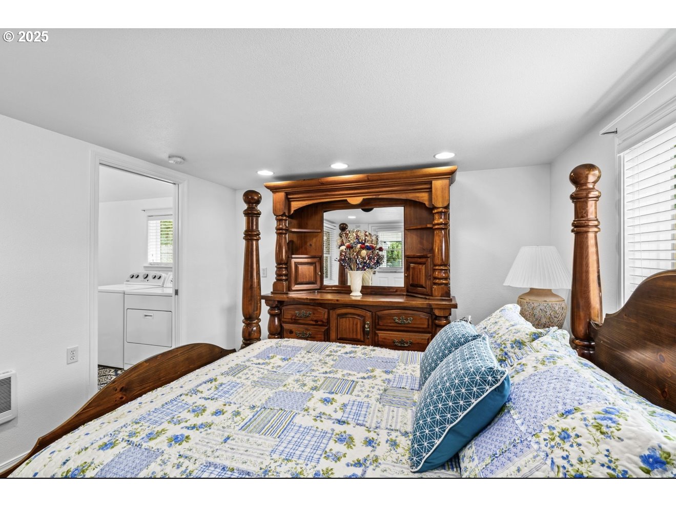 1995 Scott Road Springfield, OR 97477 - Photo 22 of 43 a bedroom with a bed and dresser with mirror