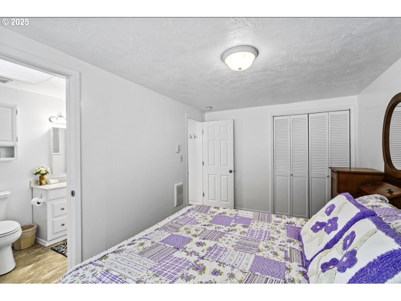 1995 Scott Road Springfield, OR 97477 - Photo 29 of 43 a bedroom with a bed and a couch