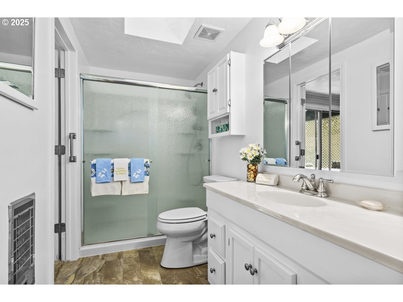 1995 Scott Road Springfield, OR 97477 - Photo 30 of 43 a bathroom with a sink a toilet and shower