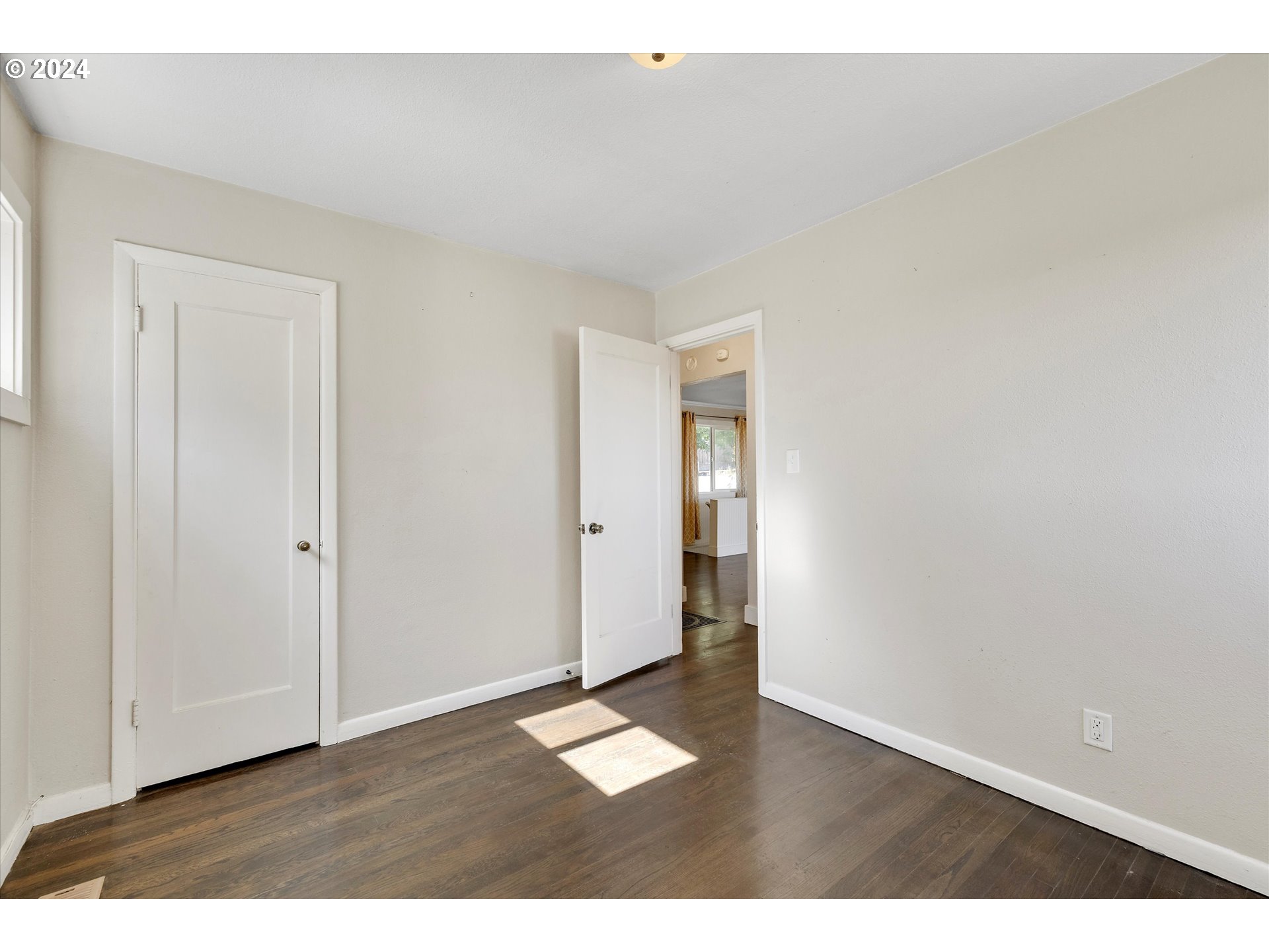 362 Southwest Oak Street Willamina, OR 97396 - Photo 16 of 34 a view of an empty room and wooden floor