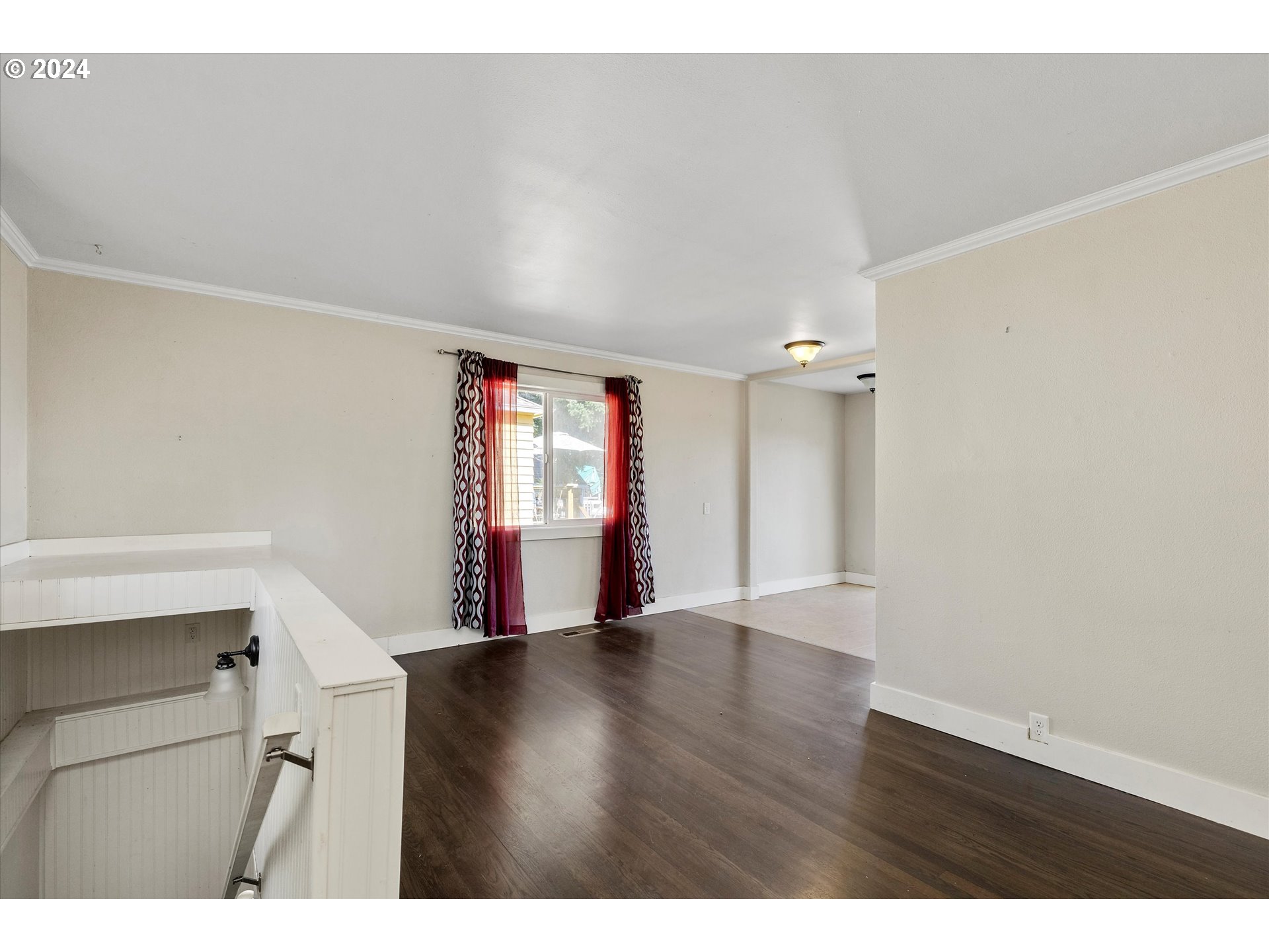 362 Southwest Oak Street Willamina, OR 97396 - Photo 6 of 34 a view of an empty room with wooden floor