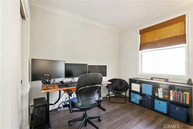 a workspace with furniture and a window