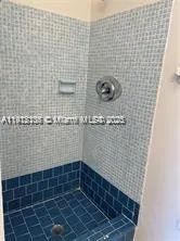 a bathroom with a toilet and a sink