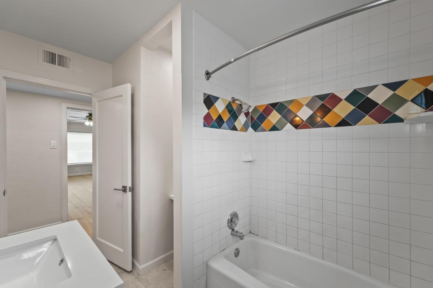 636 West 25th Street Merced, CA 95340 - Photo 23 of 31 a bathroom with a bathtub and a shower