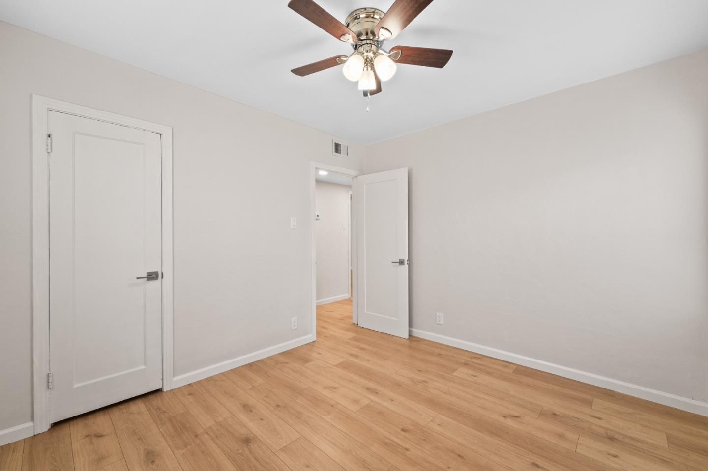 636 West 25th Street Merced, CA 95340 - Photo 27 of 31 wooden floor in an empty room