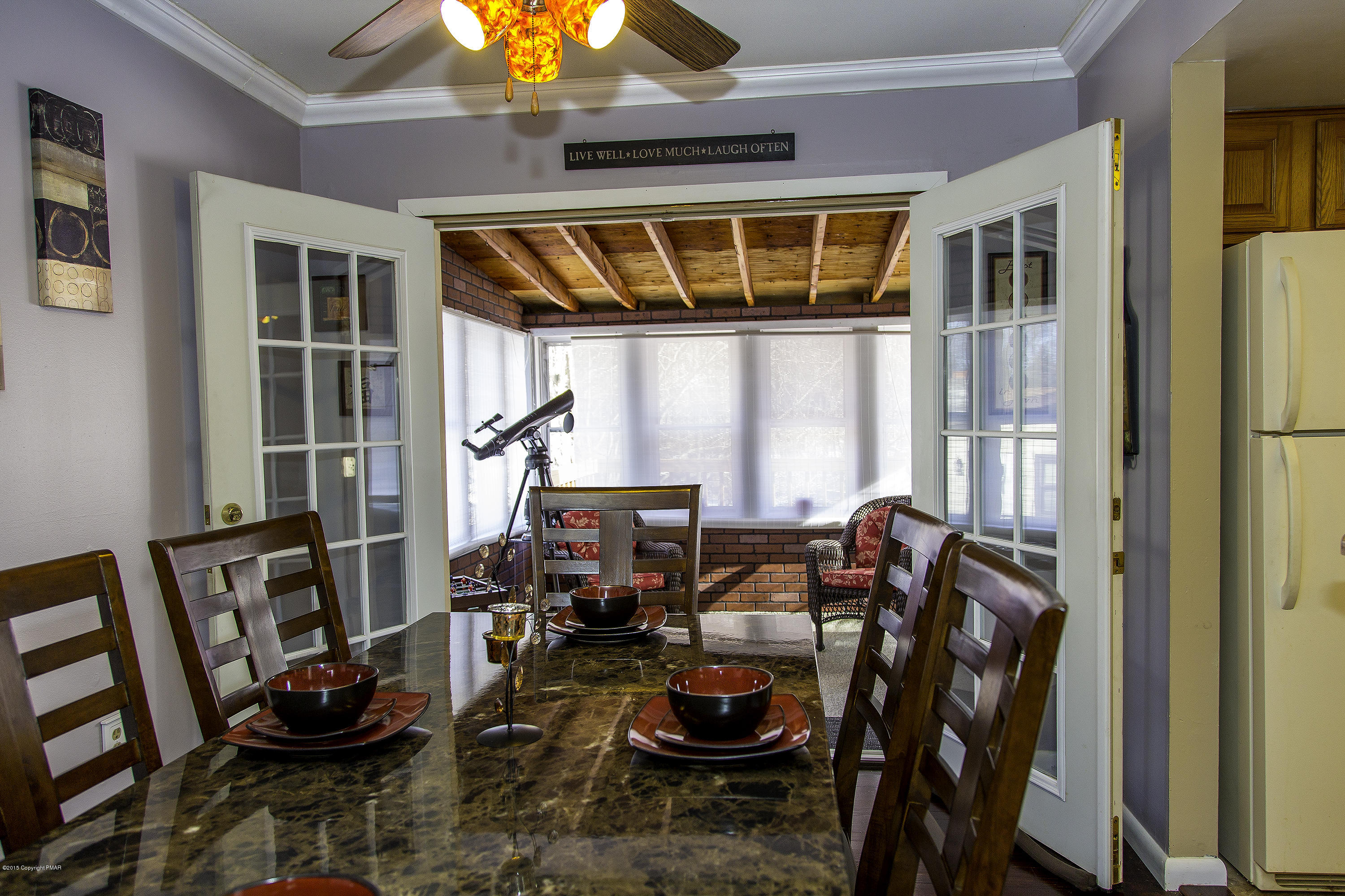 833 Stokes Mill Road Stroudsburg, PA 18360 - Photo 11 of 45 Dining Into Sunroom