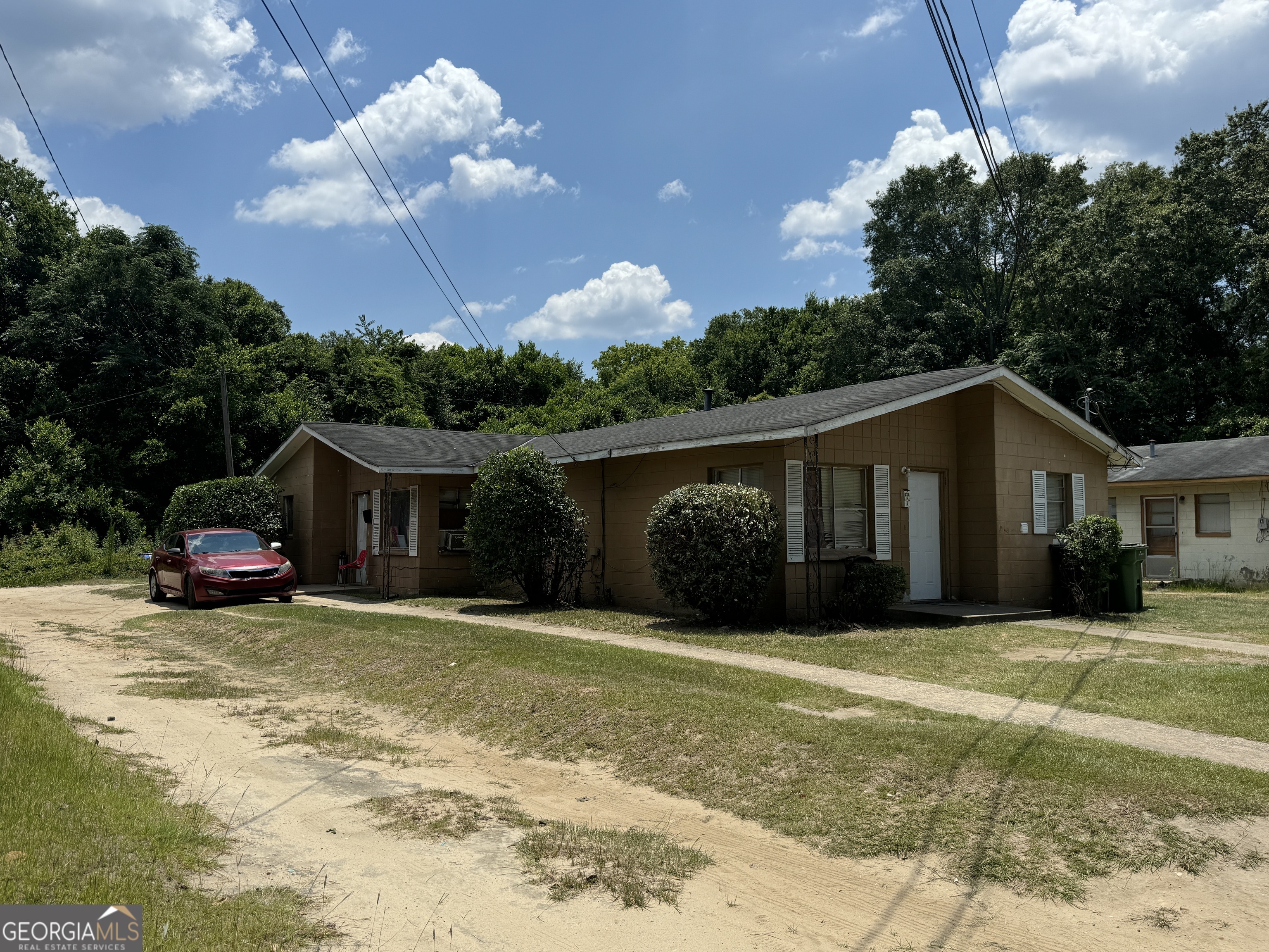 434 Mellon Street Columbus, GA 31903 - Photo 2 of 12 a view of a house with a yard