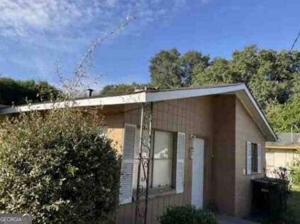 434 Mellon Street Columbus, GA 31903 - Photo 3 of 12 a view of a house with a yard