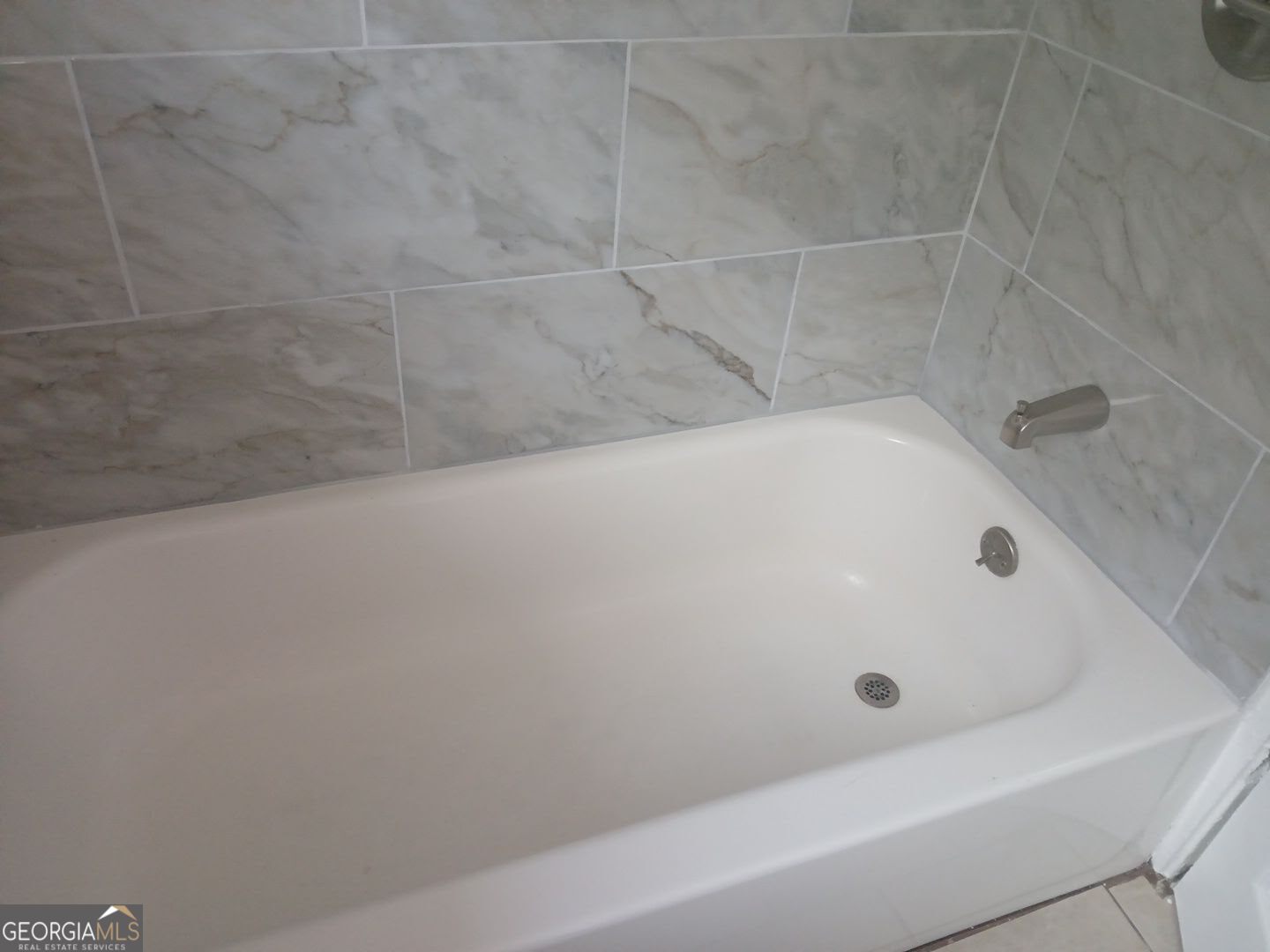 434 Mellon Street Columbus, GA 31903 - Photo 8 of 12 a bathroom with a bathtub