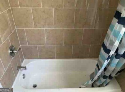 434 Mellon Street Columbus, GA 31903 - Photo 9 of 12 a bathroom with a bathtub