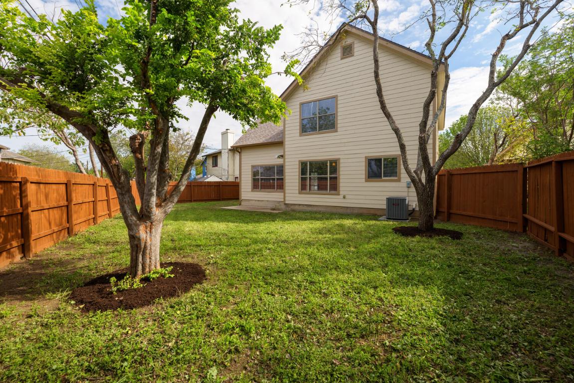 2102 Laura Court Round Rock, TX 78681 - Photo 31 of 32 a front view of a house with yard and tree