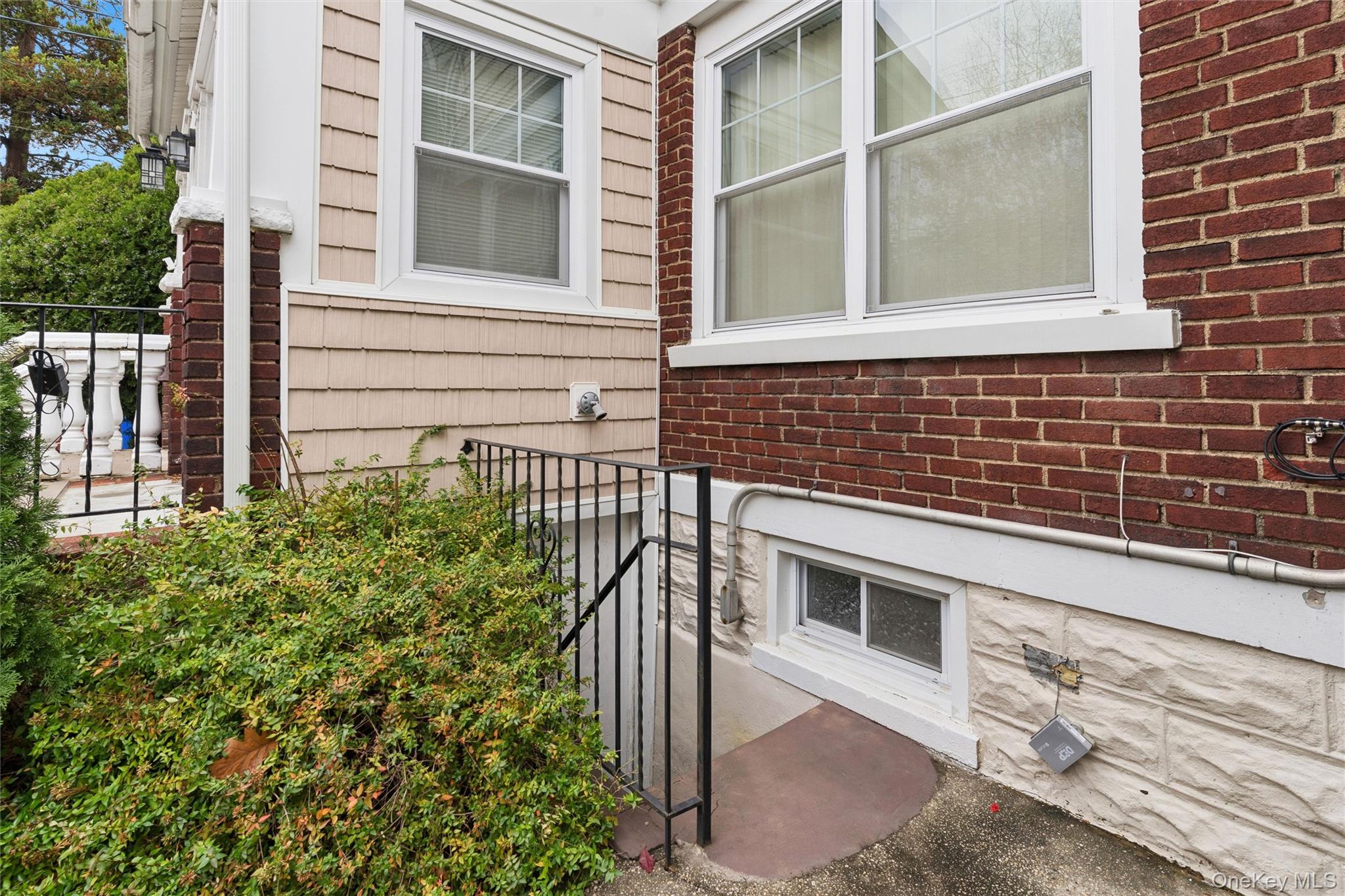 91-25 90th Street Queens, NY 11421 - Photo 27 of 30 Exterior view of brick siding
