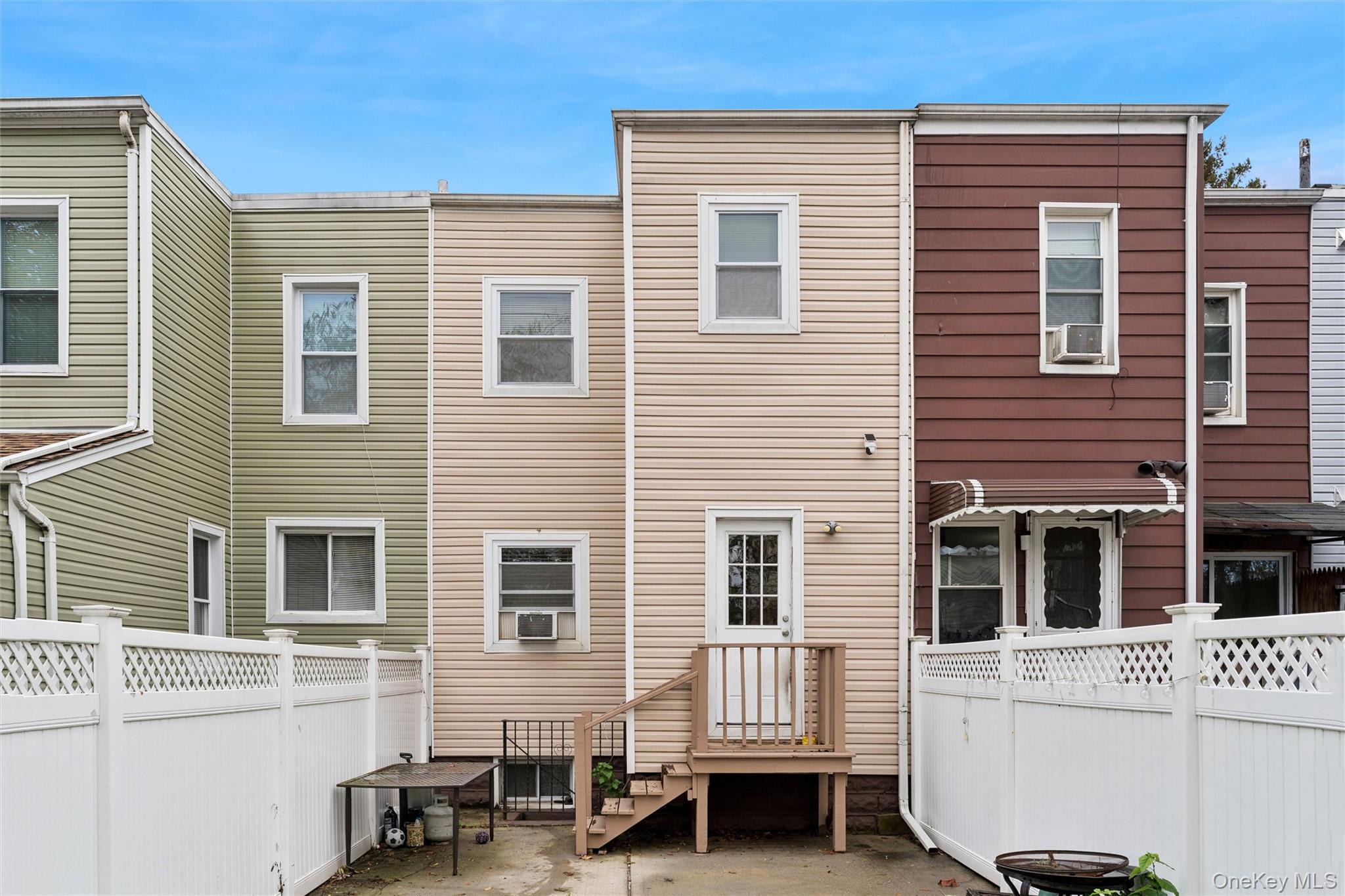 91-25 90th Street Queens, NY 11421 - Photo 29 of 30 Back of house featuring a fenced backyard