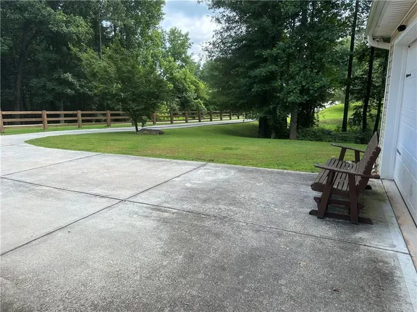 a view of a bench in a park