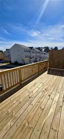 a view of balcony with furniture