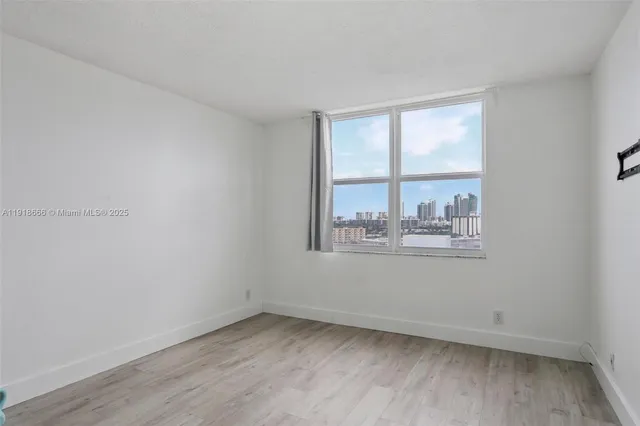 an empty room with a window