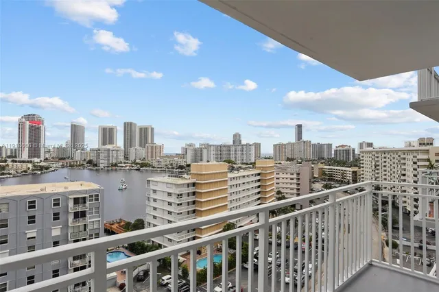 a view of city with a tall building