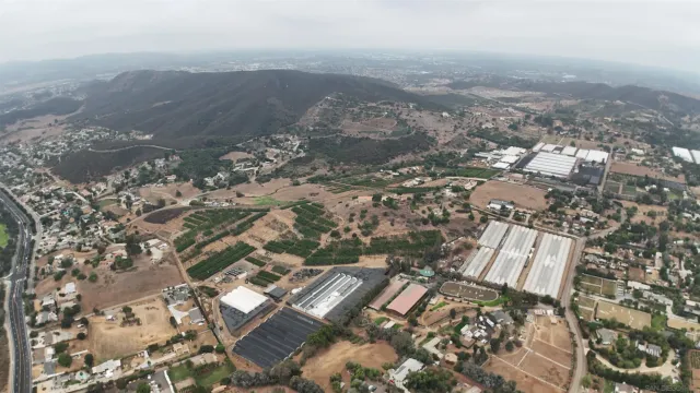 an aerial view of residential house and lake view