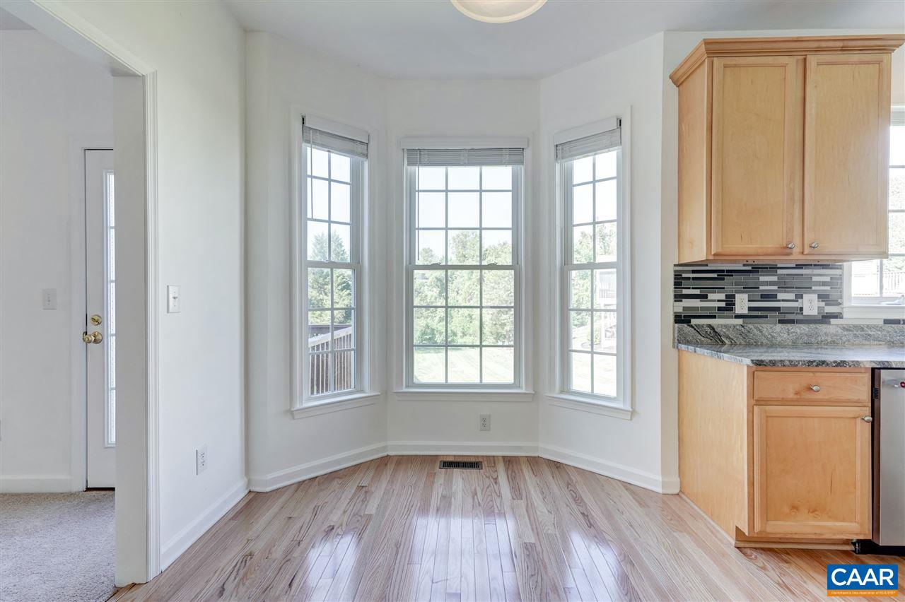 1280 Amber Ridge Road Charlottesville, VA 22901 - Photo 15 of 33 wooden floor in an empty room with a window