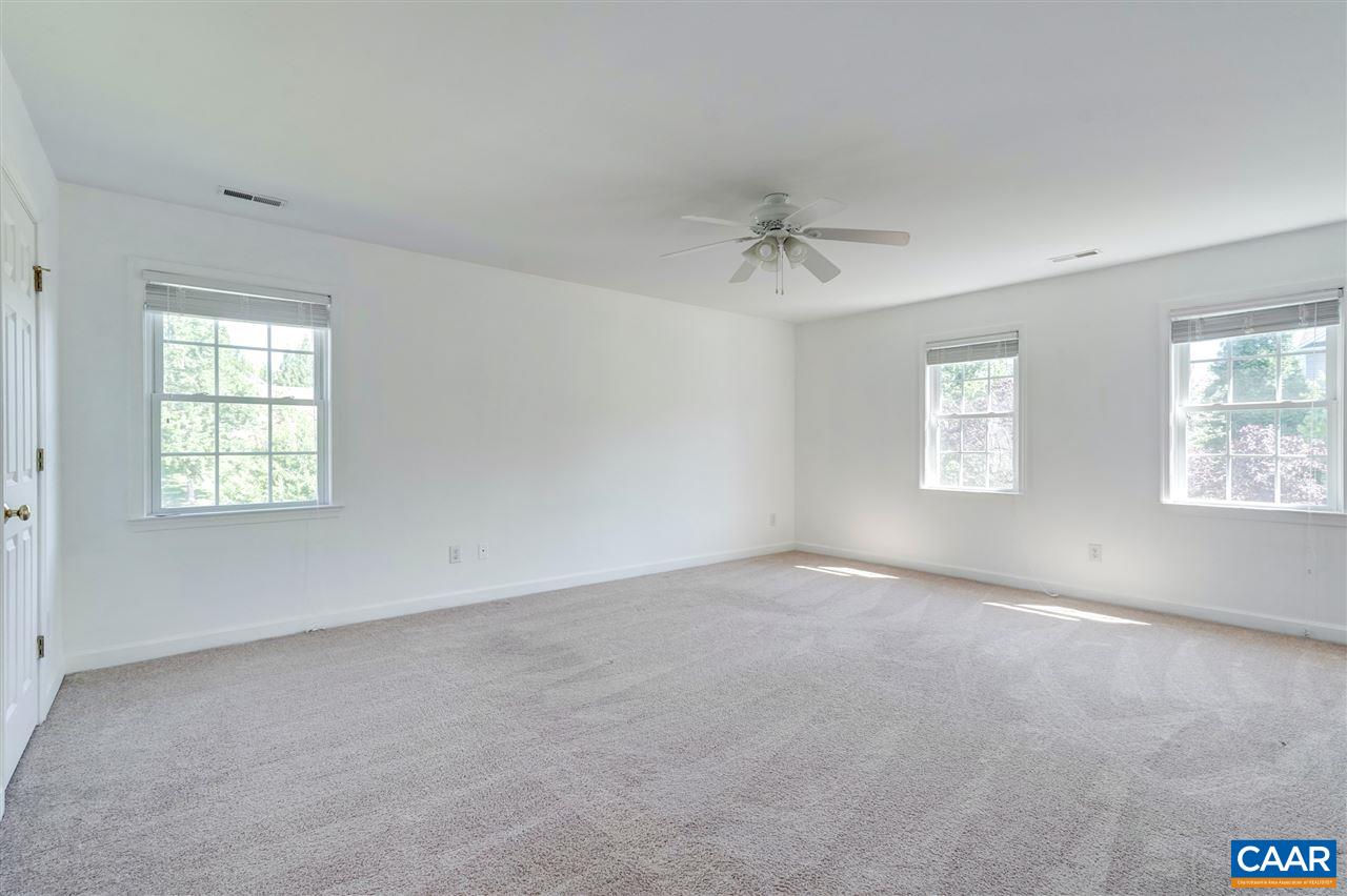 1280 Amber Ridge Road Charlottesville, VA 22901 - Photo 18 of 33 an empty room with windows