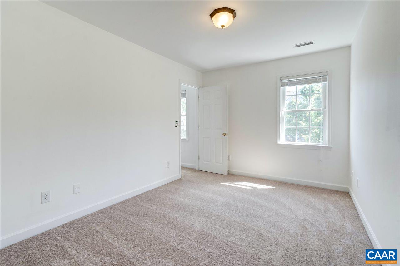 1280 Amber Ridge Road Charlottesville, VA 22901 - Photo 23 of 33 an empty room with windows
