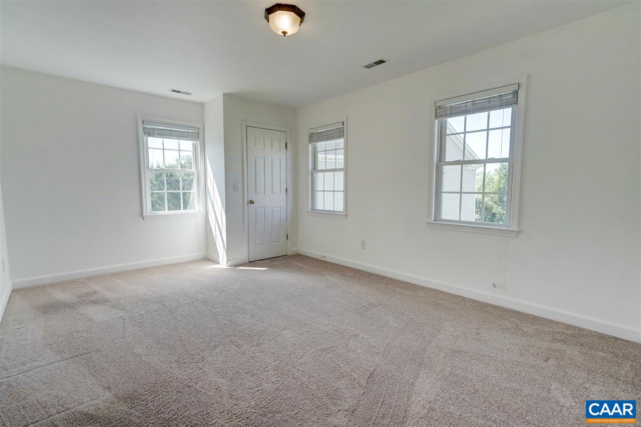 1280 Amber Ridge Road Charlottesville, VA 22901 - Photo 25 of 33 an empty room with windows