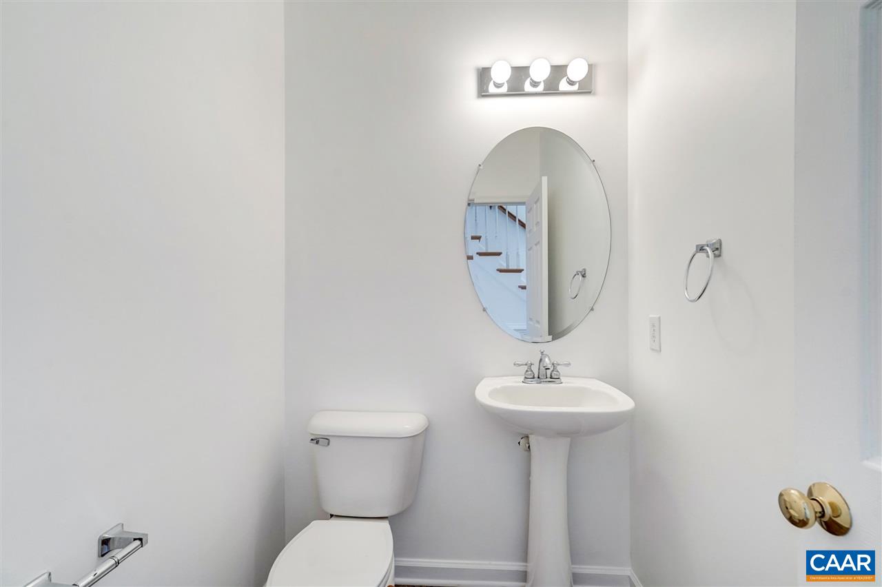1280 Amber Ridge Road Charlottesville, VA 22901 - Photo 6 of 33 a bathroom with a toilet sink and mirror