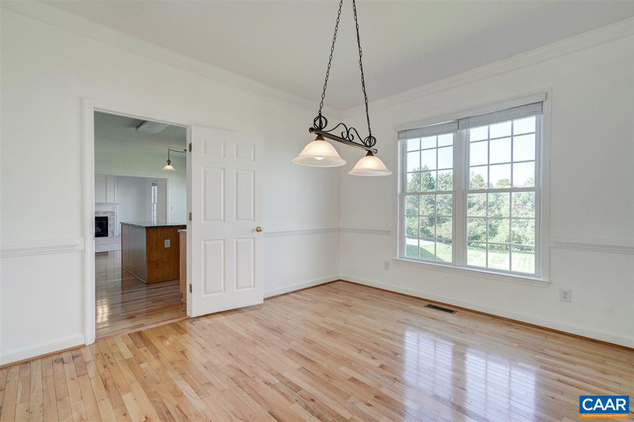 1280 Amber Ridge Road Charlottesville, VA 22901 - Photo 9 of 33 a view of an empty room with window and hardwood floor