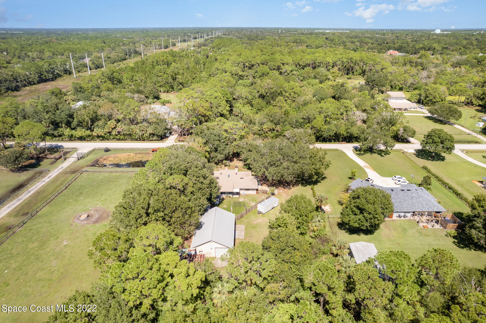 4275 Rayburn Road Cocoa, FL 32926 - Photo 18 of 26 a view of a lake with a mountain in the background