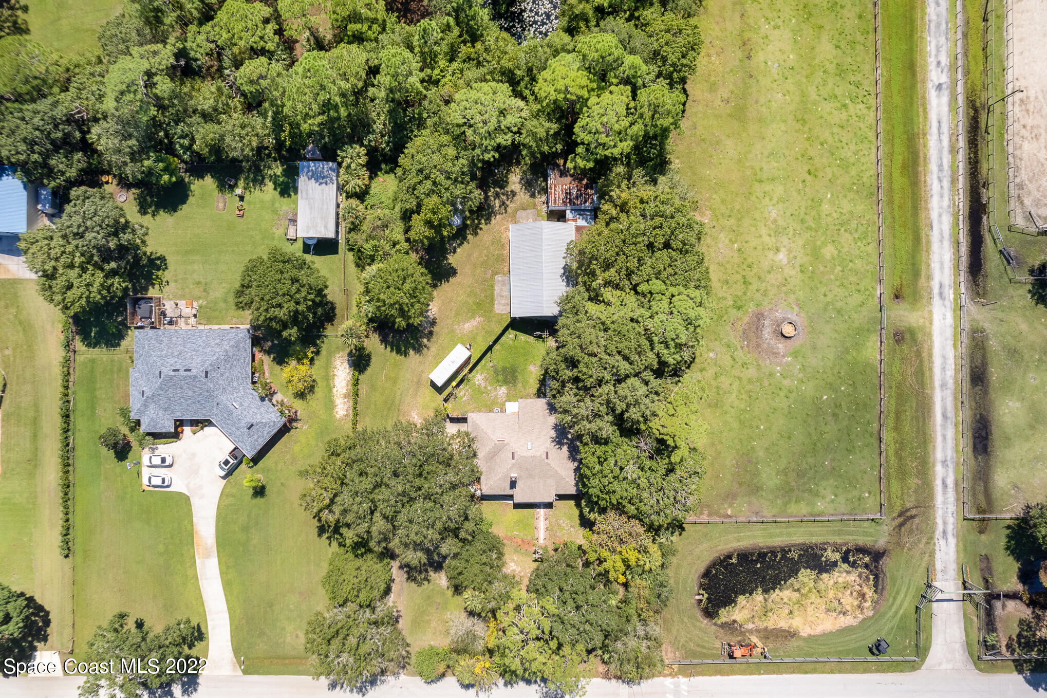 4275 Rayburn Road Cocoa, FL 32926 - Photo 2 of 26 an aerial view of a residential houses with yard