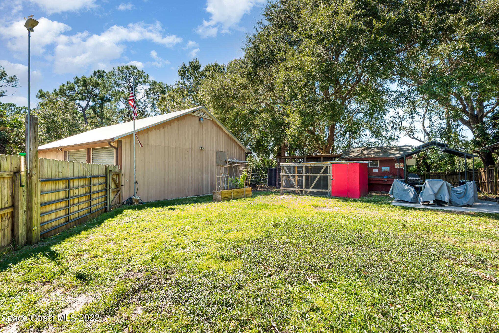 4275 Rayburn Road Cocoa, FL 32926 - Photo 21 of 26 a house view with a backyard space