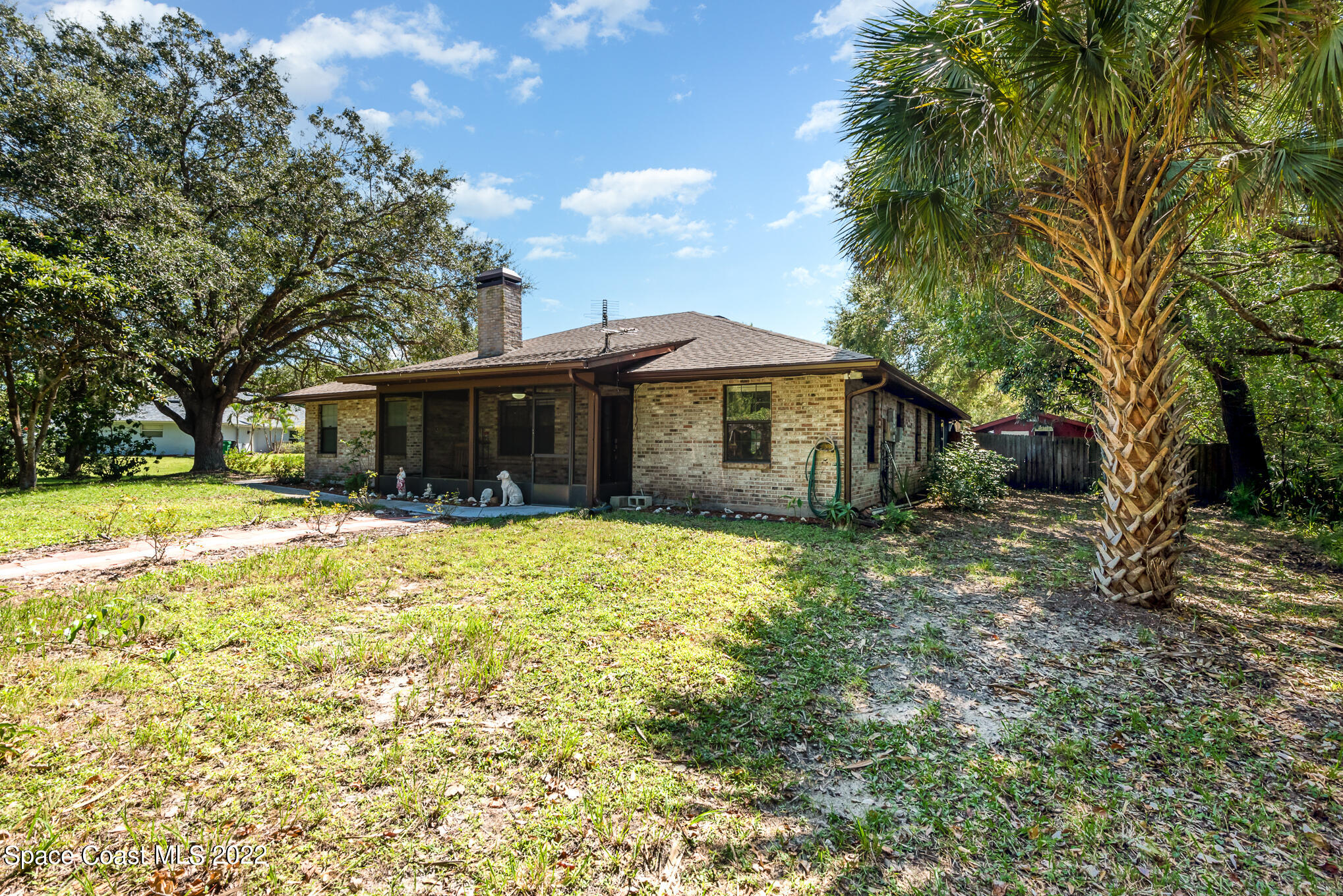 4275 Rayburn Road Cocoa, FL 32926 - Photo 26 of 26 a front view of a house with a garden