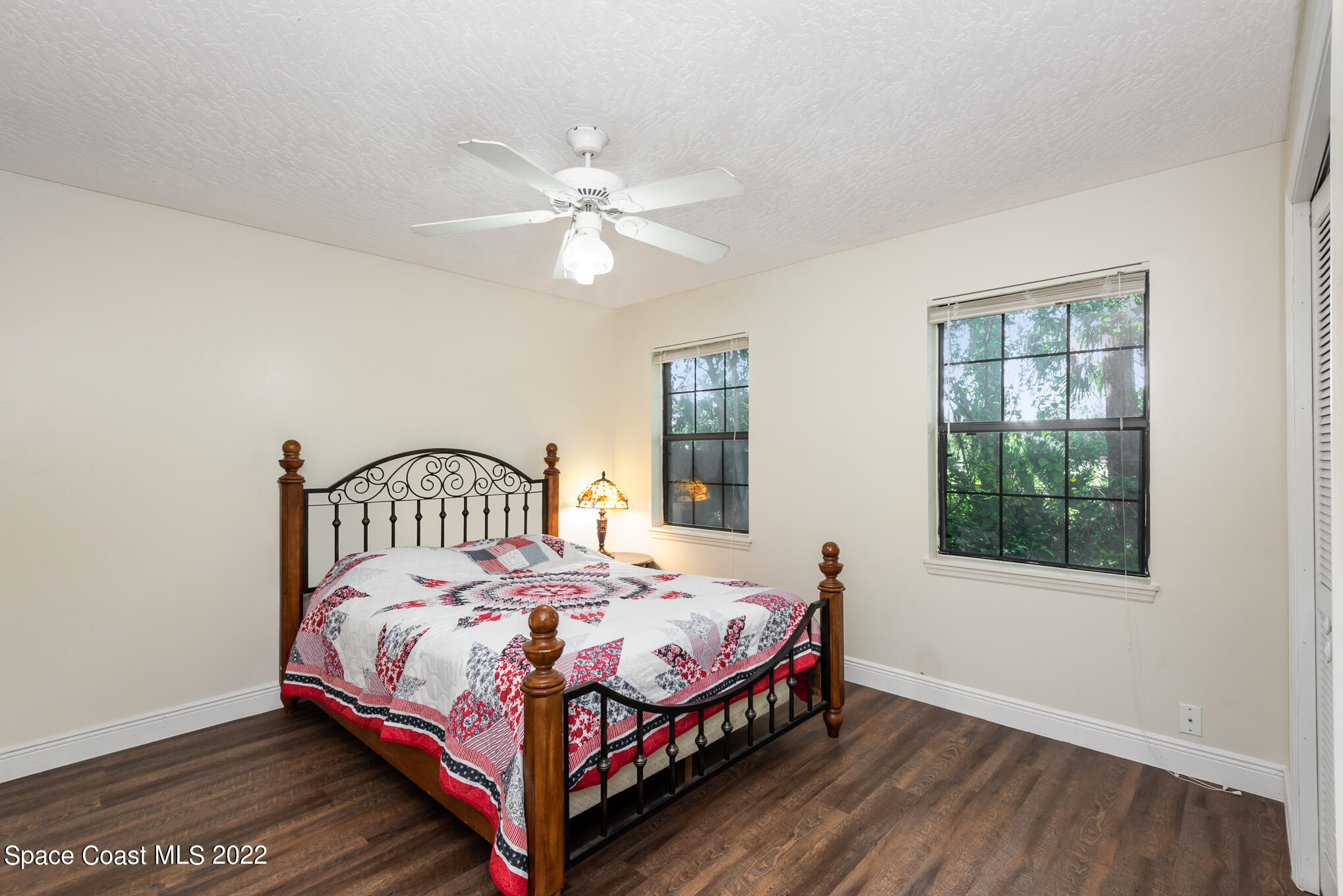 4275 Rayburn Road Cocoa, FL 32926 - Photo 9 of 26 a bedroom with a bed and a window