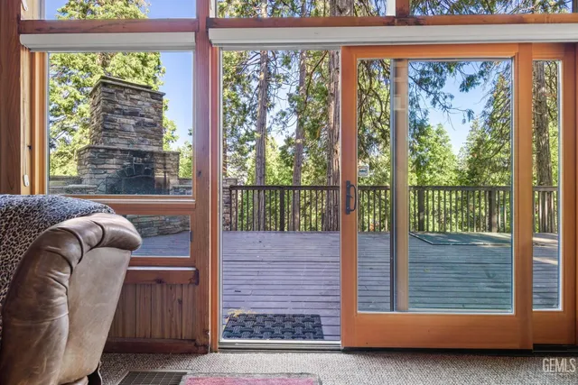 a view of balcony with furniture