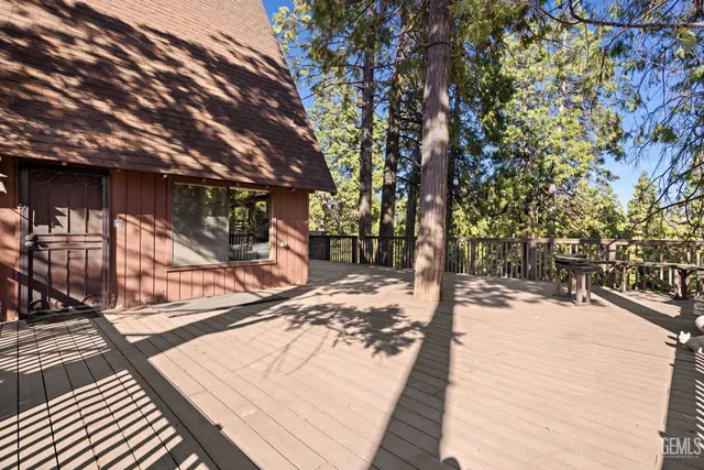 a view of wooden door and furniture